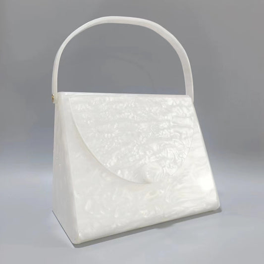 Spojková taška z akrylu s tvarem Tercet
