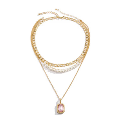 Gold Plated Multi-layered Necklace with Pearls and Pink Gemstone